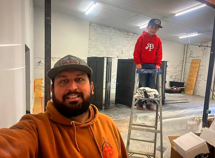 Abel Espinoza, owner of Red Barn Painting, on a job site