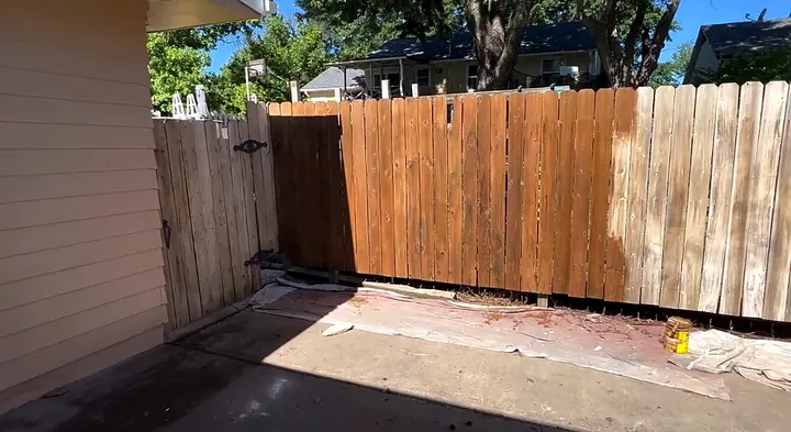 Fence staining by Red Barn Painting